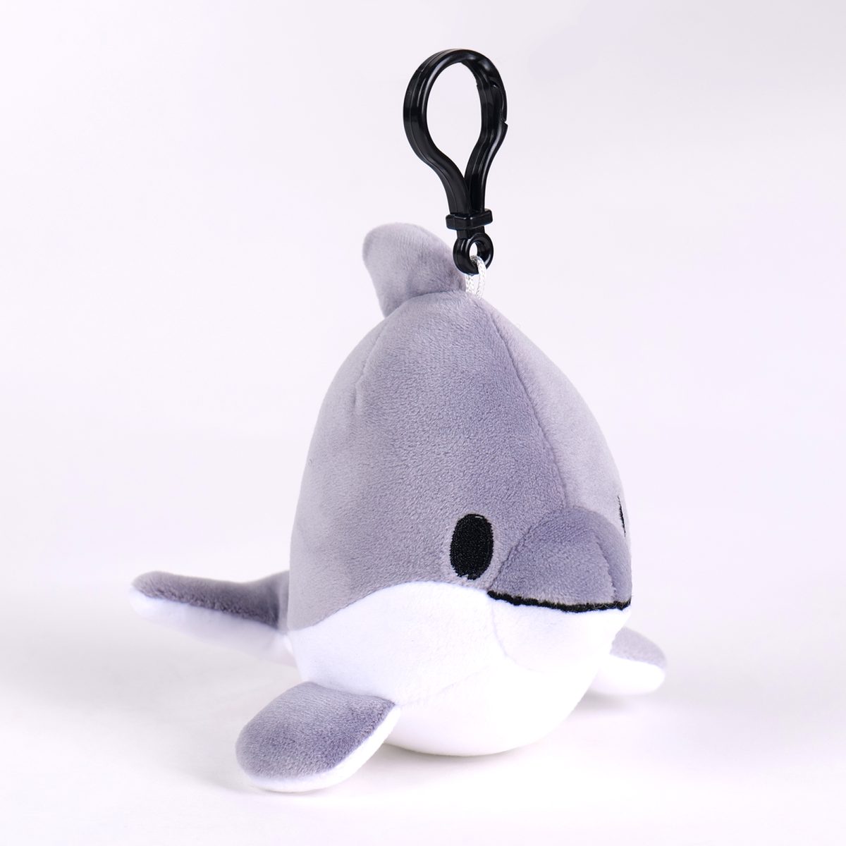 Della Dolphin plush backpack clip